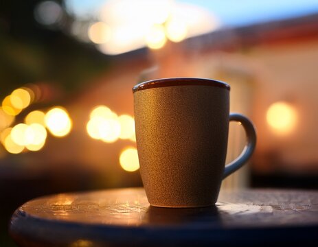 a close up image of a coffee cup placed on a table