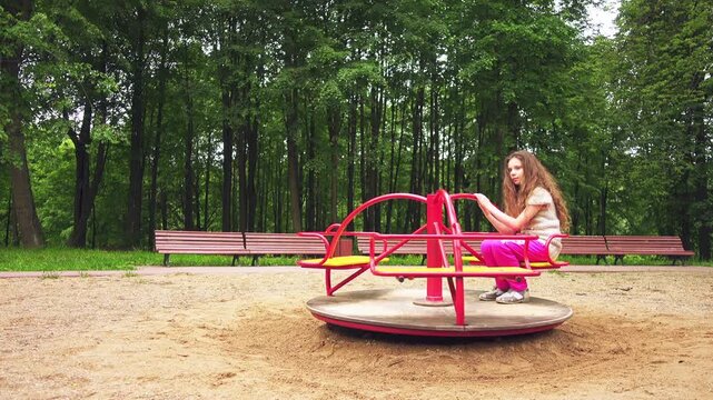 Beautiful little girl on swing