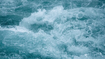 Fototapeta premium Turquoise ocean waves crashing and splashing in water