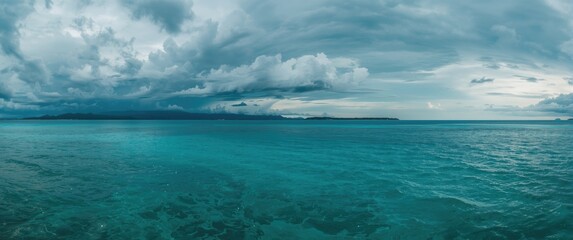 Fototapeta premium Turbulent sea under a cloudy sky at dusk
