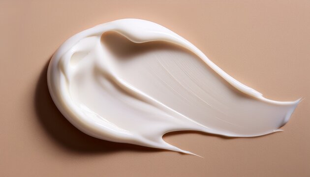 close up of a sample of a creamy white cosmetic texture on a beige background