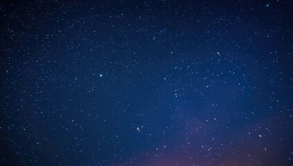 Fototapeta premium radiant blue and green stars glowing in night sky