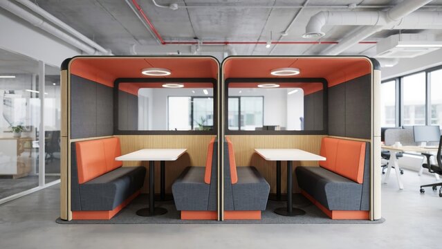 Two orange and grey office meeting pods with tables and bench seating