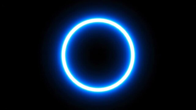 Glowing blue circle on a black background. Minimalist and modern