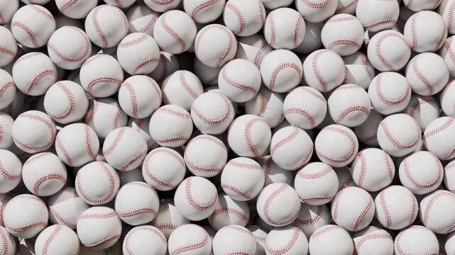 Baseballs Falling and Piling Up in Empty Space &mdash; 3D Sports Animation on Black Background