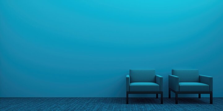 Minimalist modern armchairs against cyan wall with plenty of copy space
