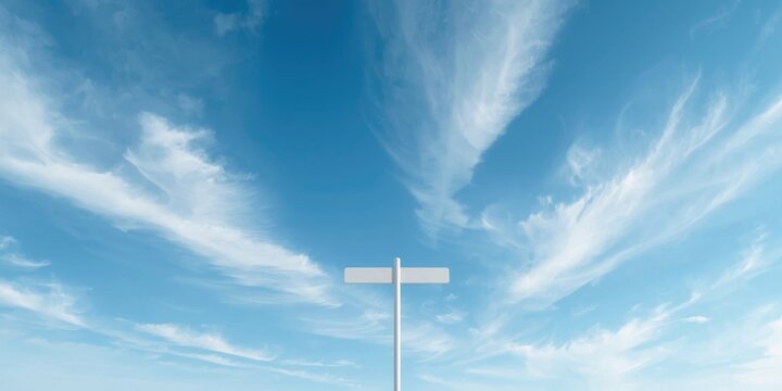 Empty street signpost against a clear blue sky