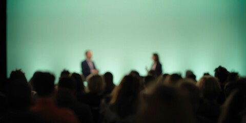 Fototapeta premium Live question and answer format set against a light green blurred background