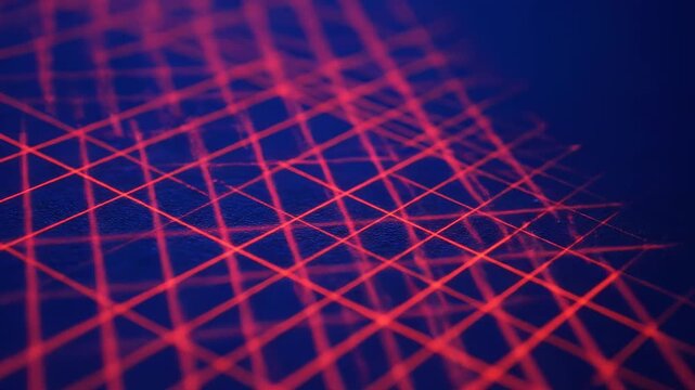 Glowing red laser beams creating a grid-like pattern on a dark blue surface, with depth