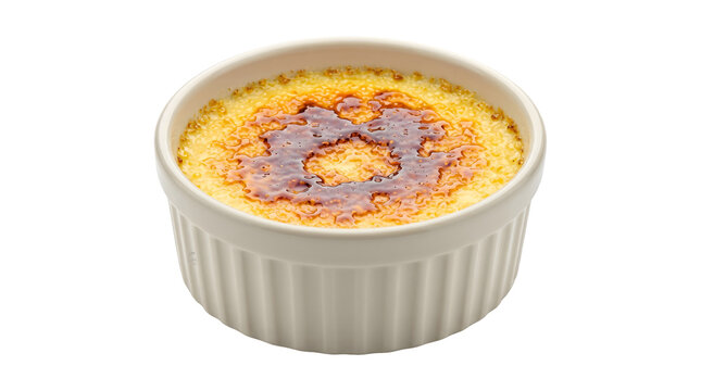 Creme brulee with golden caramelized sugar crust in a white ribbed ramekin presented as a PNG on a transparent background