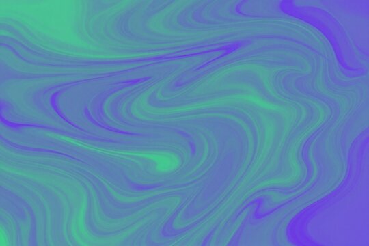 A close up of a green and blue swirl pattern