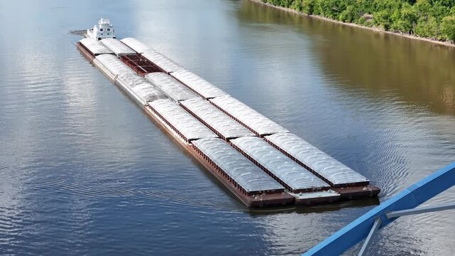 Large river barge set passing under blue steel arch bridge Part 1