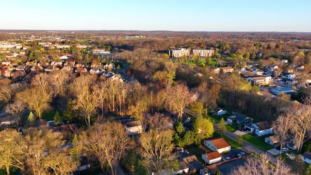 Waterfront residential houses aerial view in the morning on Walled Lake in city of Novi, Michigan MI, USA. 