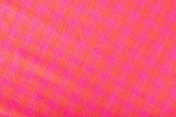 Fototapeta premium Pink and Orange Cotton Fabric Texture with Woven Check Pattern