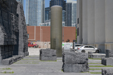 Obraz premium cylindrical column of stacked structural glass blocks, a beacon of hope, at Ireland Park, Toronto