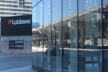 Obraz premium street sign facing Lake Shore Blvd E of Loblaws Lower Jarvis St, Toronto