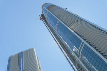 Obraz premium (at left) skyward view of the SkyTower designed by Hariri Pontarini Architects nearing completion at Pinnacle One Yonge St, Toronto
