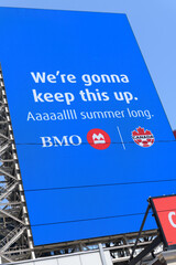 Obraz premium digital billboard advertisement for BMO, Bank of Montreal and sponsor of Soccer Canada at Sankofa Square, Toronto
