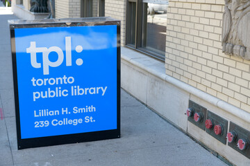 Obraz premium tpl: Toronto Public Library sign outside Lillian H Smith branch located at 239 College St