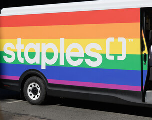 Obraz premium Staples wordmark on the side of a float with rainbow at Pride Day parade 2026, Toronto 