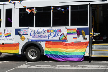 Obraz premium long-term seniors ambulatory shuttle or minibus all decked out for Pride Day Parade 2026, Toronto