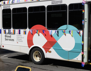 Obraz premium Canadian Blood Services branded mobile unit at Pride Day Parade 2026, Toronto