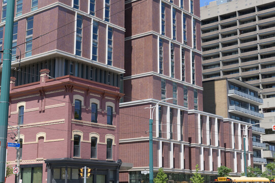 exterior of Oak House, a University of Toronto residence at 700 Spadina Ave., incorporates restored c.1900 buildings that housed butcher William J. Buckingham's grocery, other shops and apartments