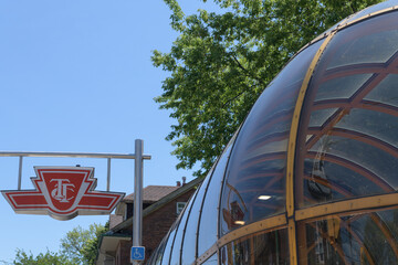 Obraz premium suspended logo sign outside Dupont station, Line 1, located at 263 Dupont St (southeast corner at Spadina Rd), Toronto