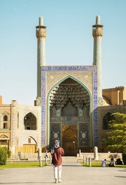 Isfahan, Iran - 15th may, 2022: Entrance into the Friday Mosque (Jame Mosque Of Isfahan) with garden foreground