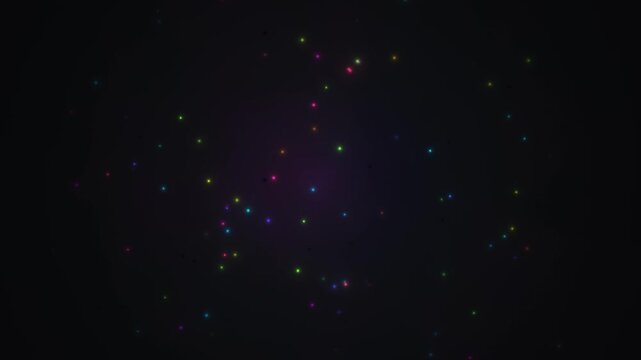 Colorful particles move in dark background