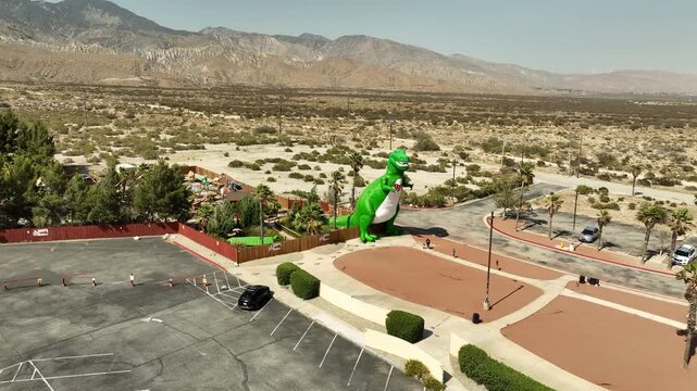 Cabazon California USA - June 25 2025: Cabazon Dinosaurs Aerial Shot of T Rex Orbit Right California USA