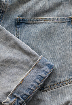Close-up of denim jacket pocket and cuff