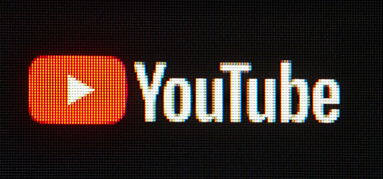 YouTube logo text on pixelated screen display