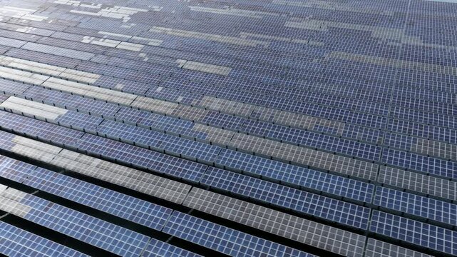 Aerial view of fishery-solar complementary photovoltaic power station on water