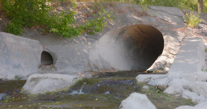 Large round sewage outlet contributing to coastal pollution