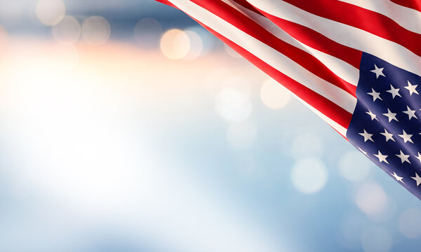 Empty banner template with american flag corner and soft bokeh light effects background area.