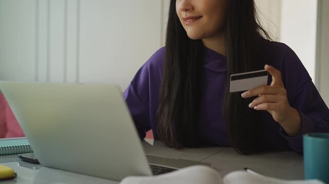 Young Korean woman experiencing an online payment issue, financial fraud victim