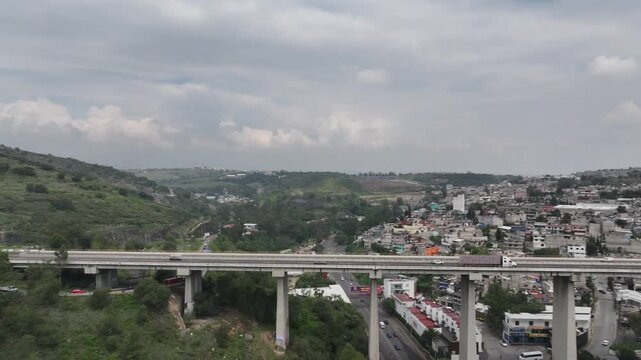Aerial Panning Shot of Highway Bridge Traffic with Trailer Truck in Atizap&aacute;n, Estado de M&eacute;xico