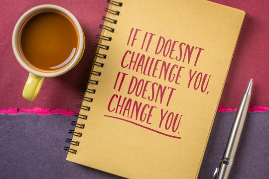 If It Doesn't Challenge You, It Doesn't Change You &ndash; motivational quote handwritten in a spiral sketchbook beside a cup of coffee, symbolizing resilience, personal growth, determination, and success.