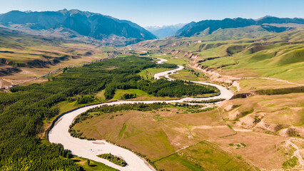 Aerial View of Kekesu River with Fields, Forests, and Pastures in Yili, Xinjiang, China © Yi