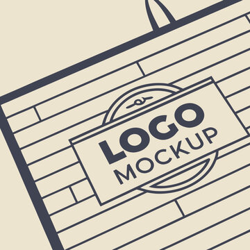 Close-up of a fabric with a logo featuring the text 'logo mockup' in a rectangular emblem