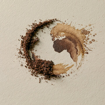 Abstract yin yang symbol made of coffee grounds and liquid stain