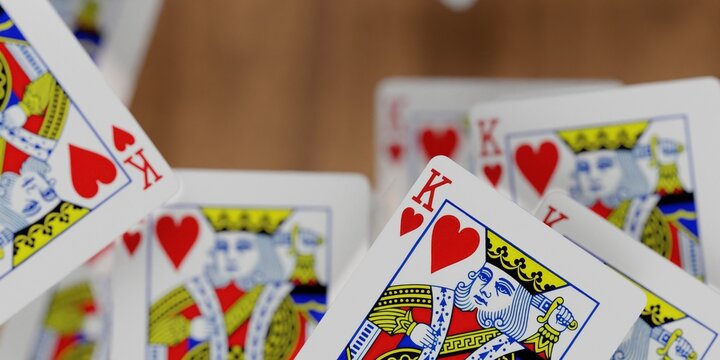 king of hearts playing cards in a pile