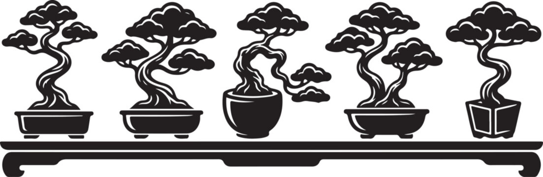 Set of five black silhouette bonsai trees in pots on a wooden display table