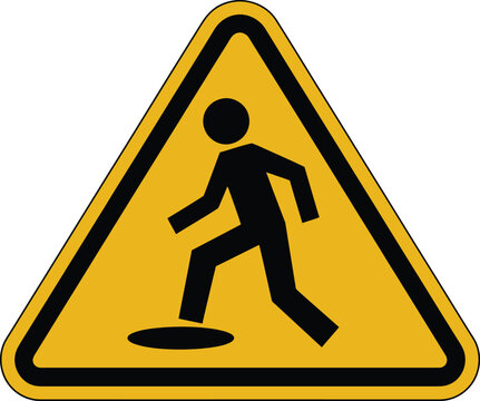 Warning sign with a black pictogram of a person stepping into a hole on a yellow triangular background