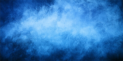 Abstract blue grunge background with clouds, fog, smoke and light textures evoking stormy sky, sea, mist, water motion and atmospheric weather design © Anna