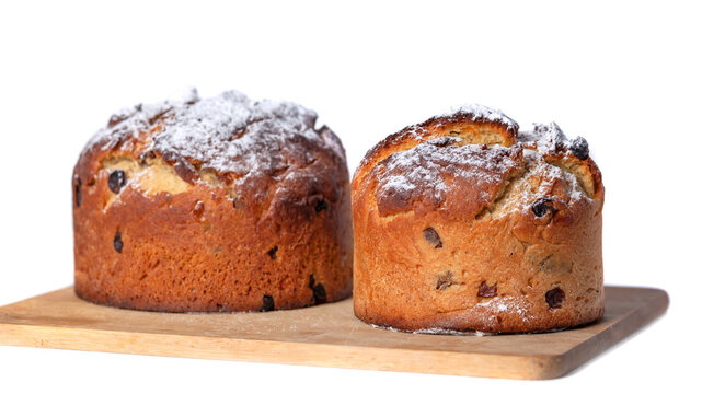Traditional home-baked Easter cakes paska on a white background. Food