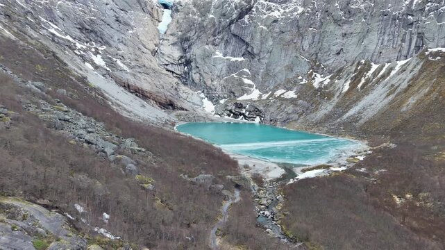 Aerial view of Briksdalsbreen glacier and lake in autumn, Norway.