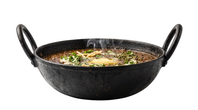 Traditional Dal Makhani in black iron kadai, authentic Indian lentil curry with butter and herbs, steaming hot spicy dal makhani for restaurant menu isolated PNG with Transparent Background