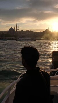 Male Traveler Watching Sunset Over the Bosphorus in Istanbul